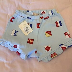 The Beaufort Bonnet Company Light Blue Nautical Flag Ruffle Skort